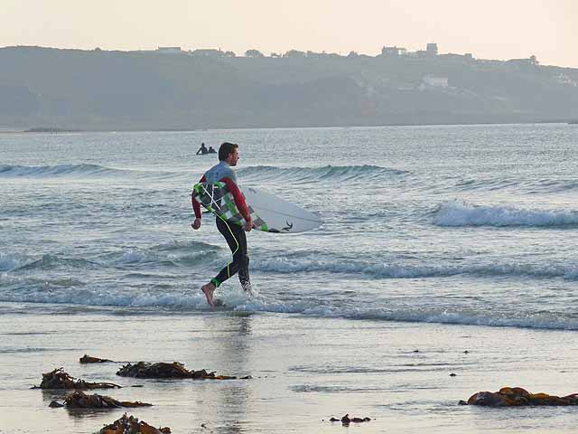 Surfer at St Ouen's Bay