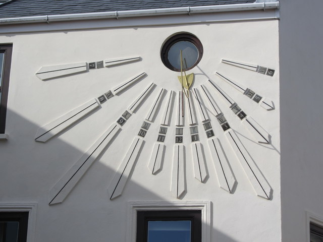 Sun dial on house in Victoria Street, St Anne