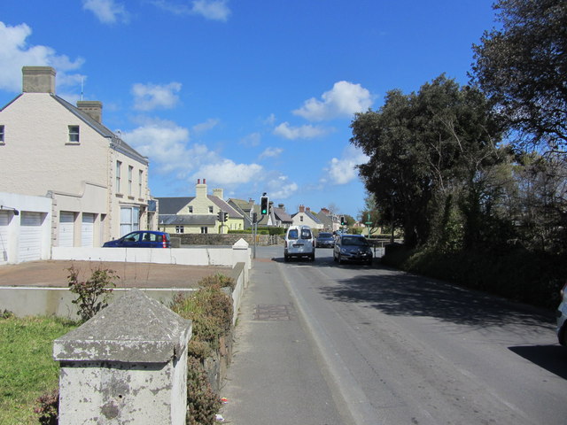 The crossroads at junction with  Landes du Marche, Route du Camp Du Roi, Longue Rue and Les Rouvets Roado
