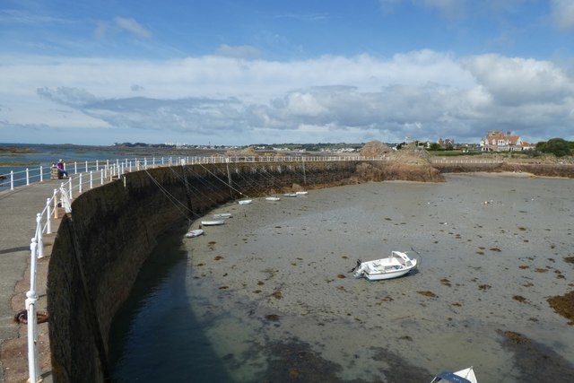 Along the harbour wall